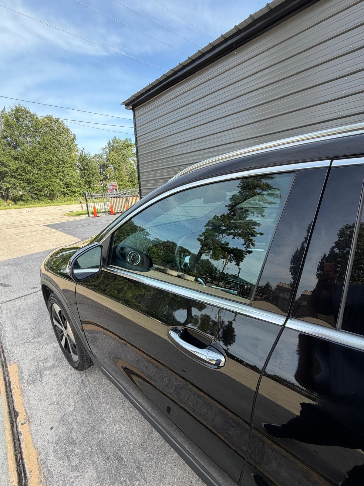 SUV — freshly tinted, One Stop Auto