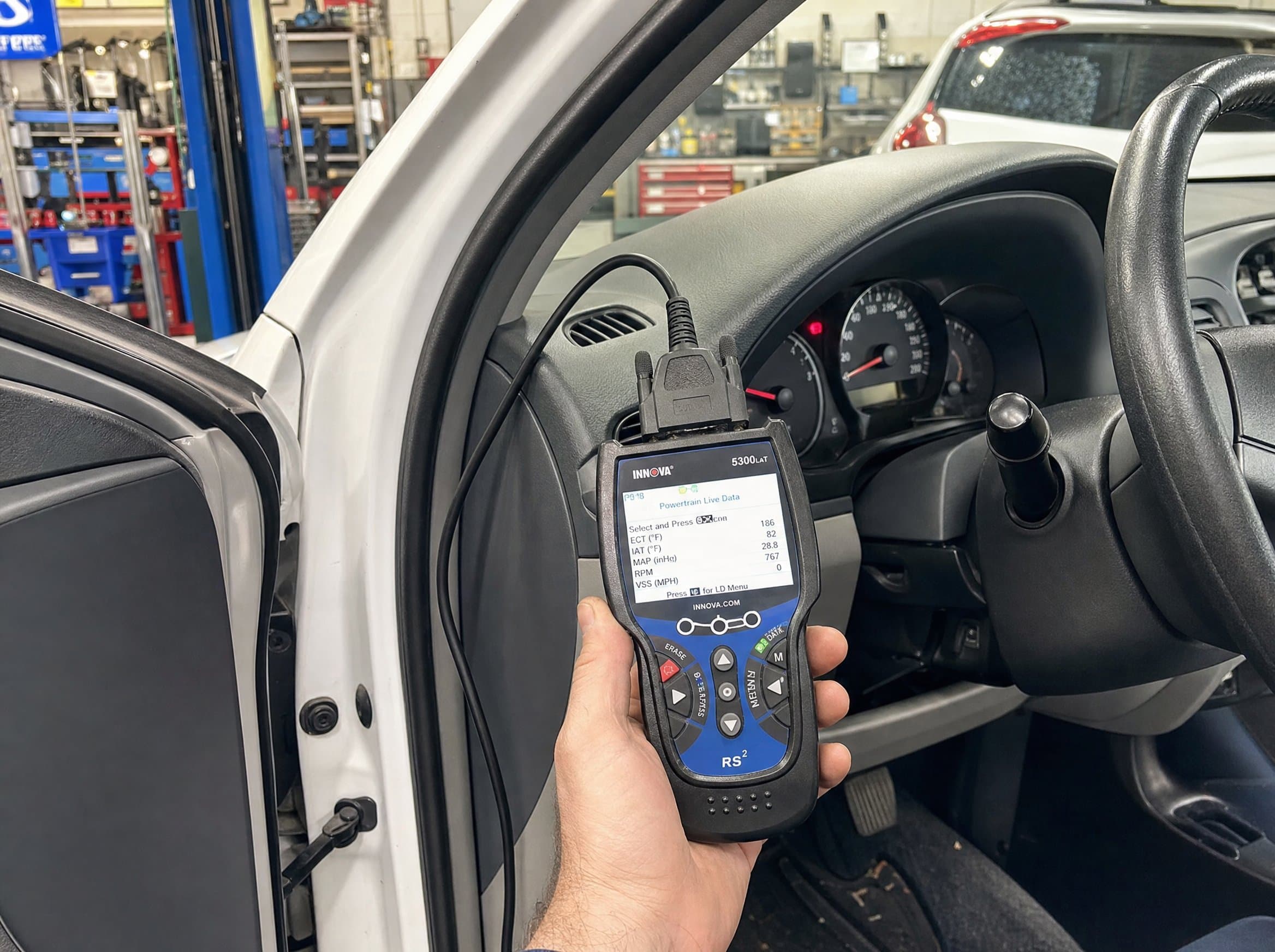 Handheld OBD-II diagnostic scanner used for Texas state inspections